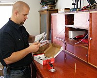 Travis Peacock at his reloading bench