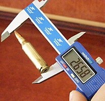 Verify length of cartridge with seated bullet
